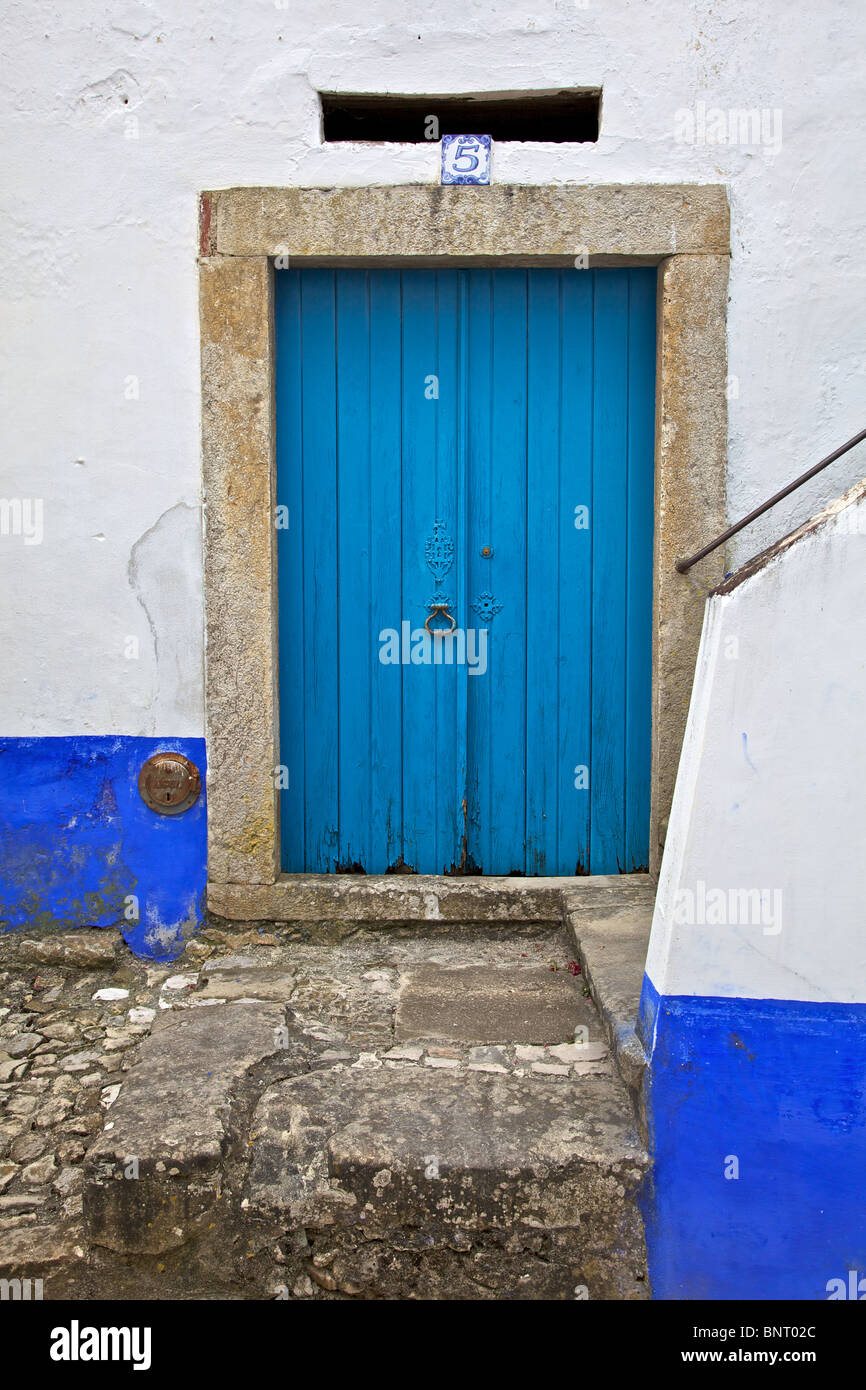 Blue Wood Rustic Wood Door of the Medieval Village of Obidos Stock Photo