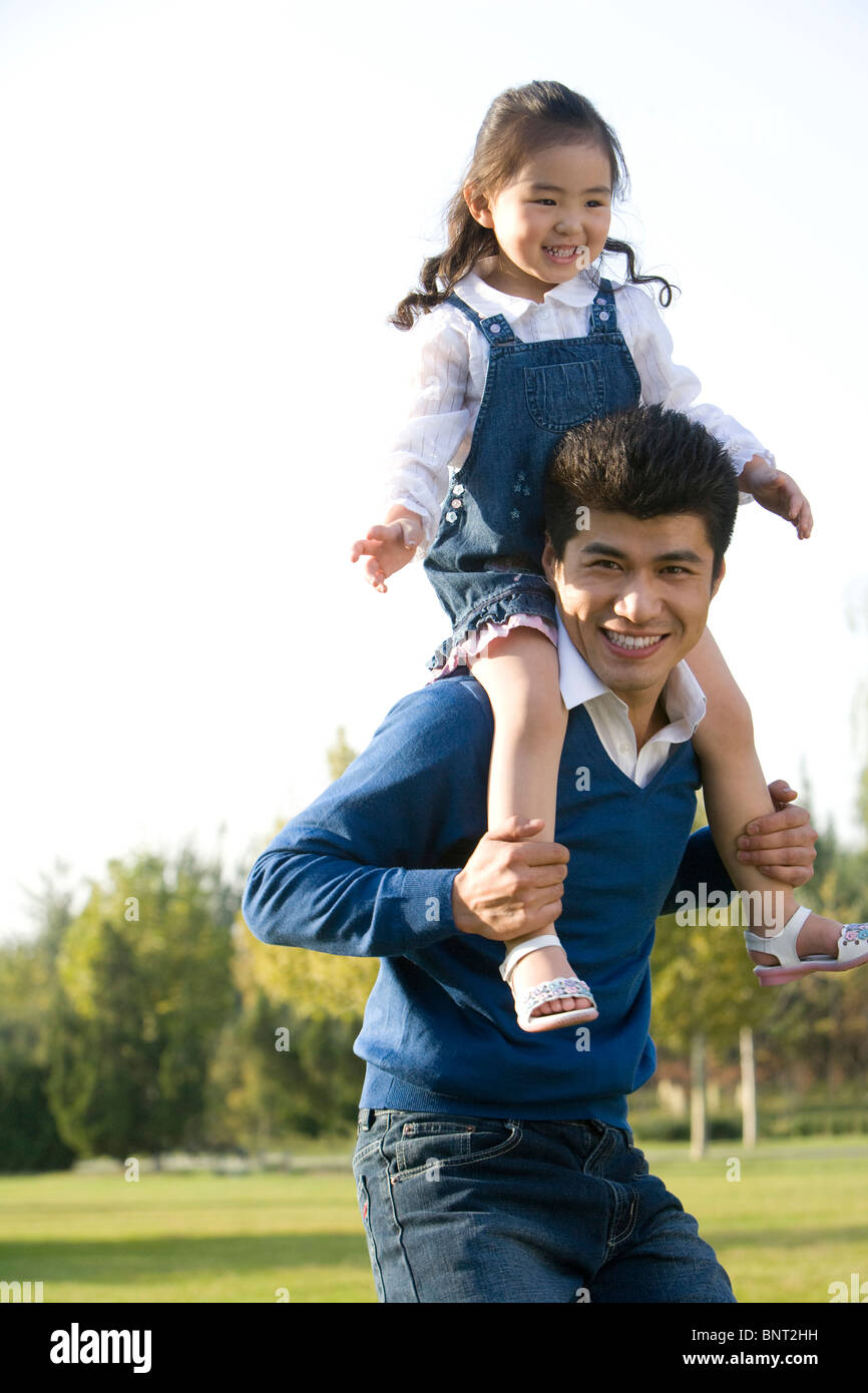 Portrait of father and daughter at the park Stock Photo - Alamy