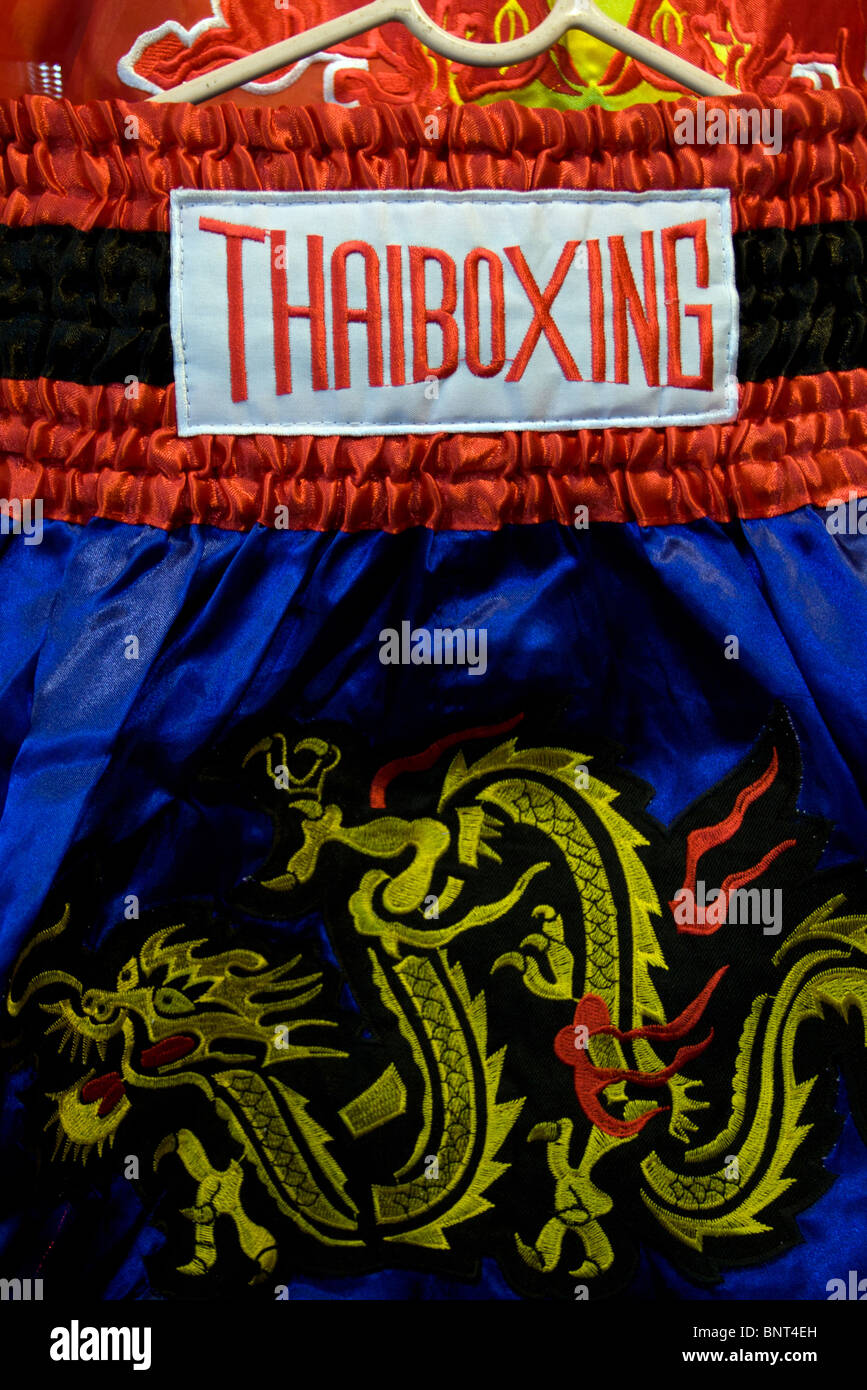 Thai boxing shorts for sale in a night market, Thailand Stock Photo Alamy