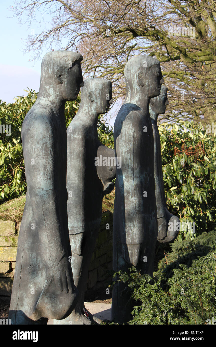 The German World War One cemetary at Langemarck, Belgium. The sculpture of four mourning German soldiers by Prof Emil Krieger Stock Photo