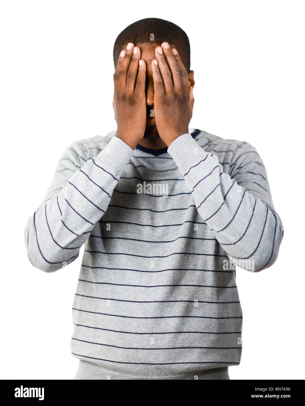 Man covering his face Stock Photo Alamy