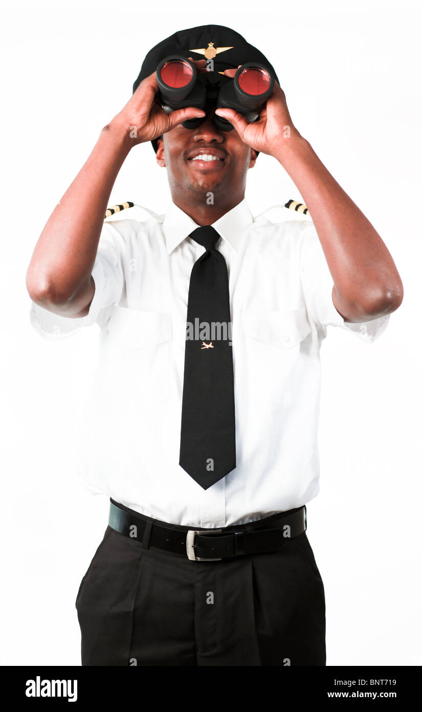 Pilot looking through Binoculars Stock Photo