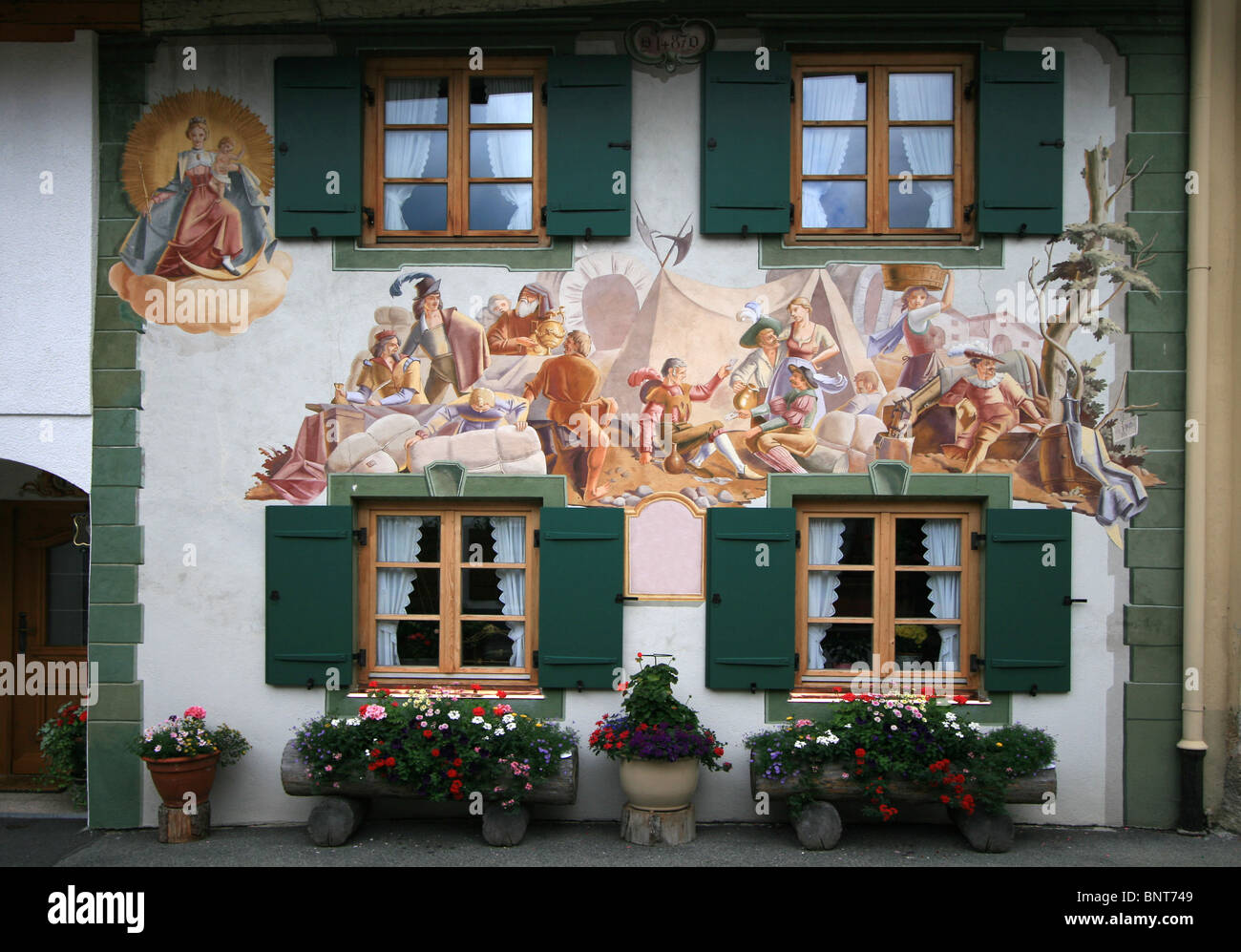 Oberammergau in the Bavarian region of Southern Germany. Many of the buildings are painted with the stunning Trompe L'oeil effec Stock Photo