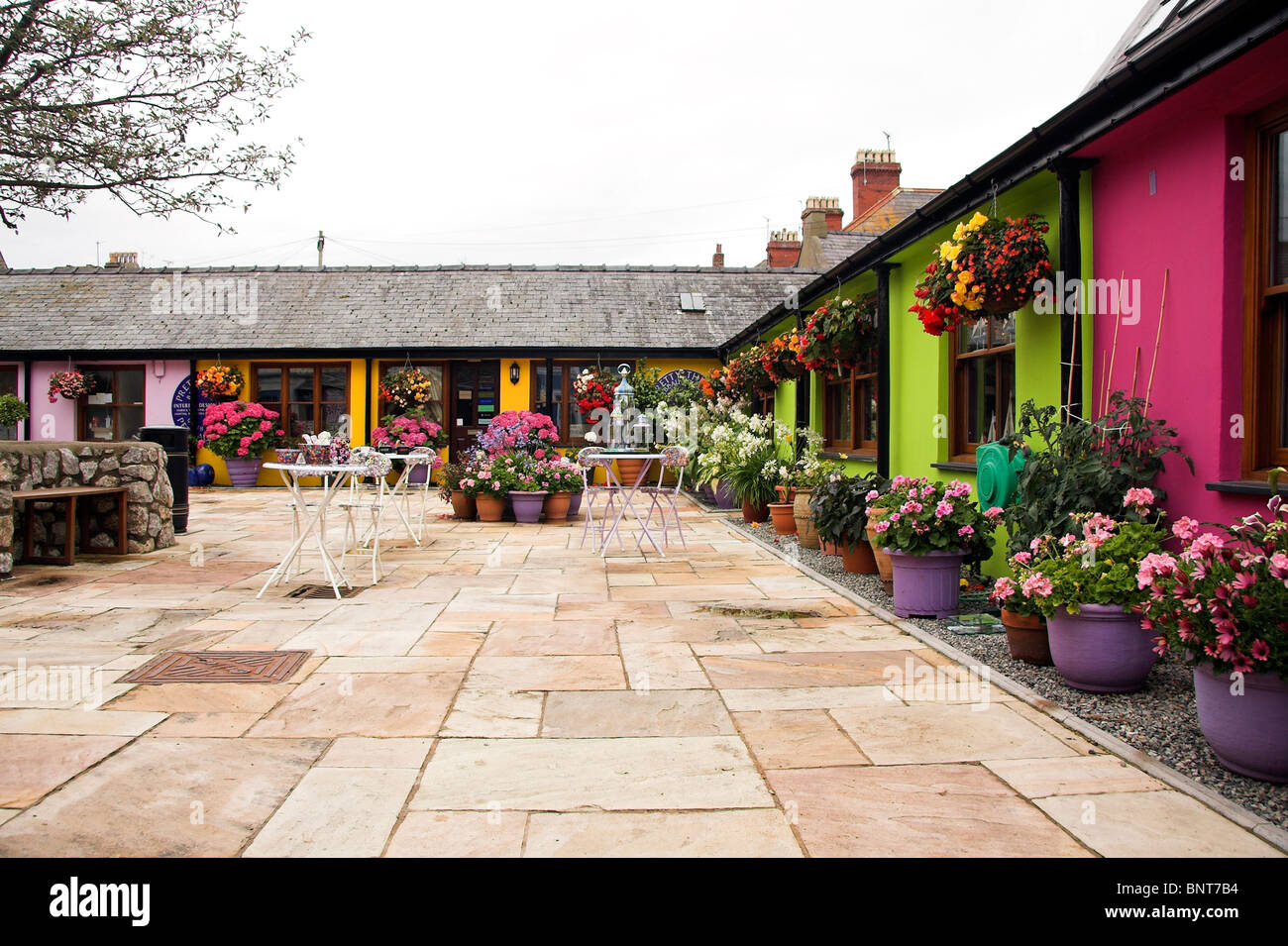 Courtyard with colourful painted shops, Beaumaris, Anglesey, North