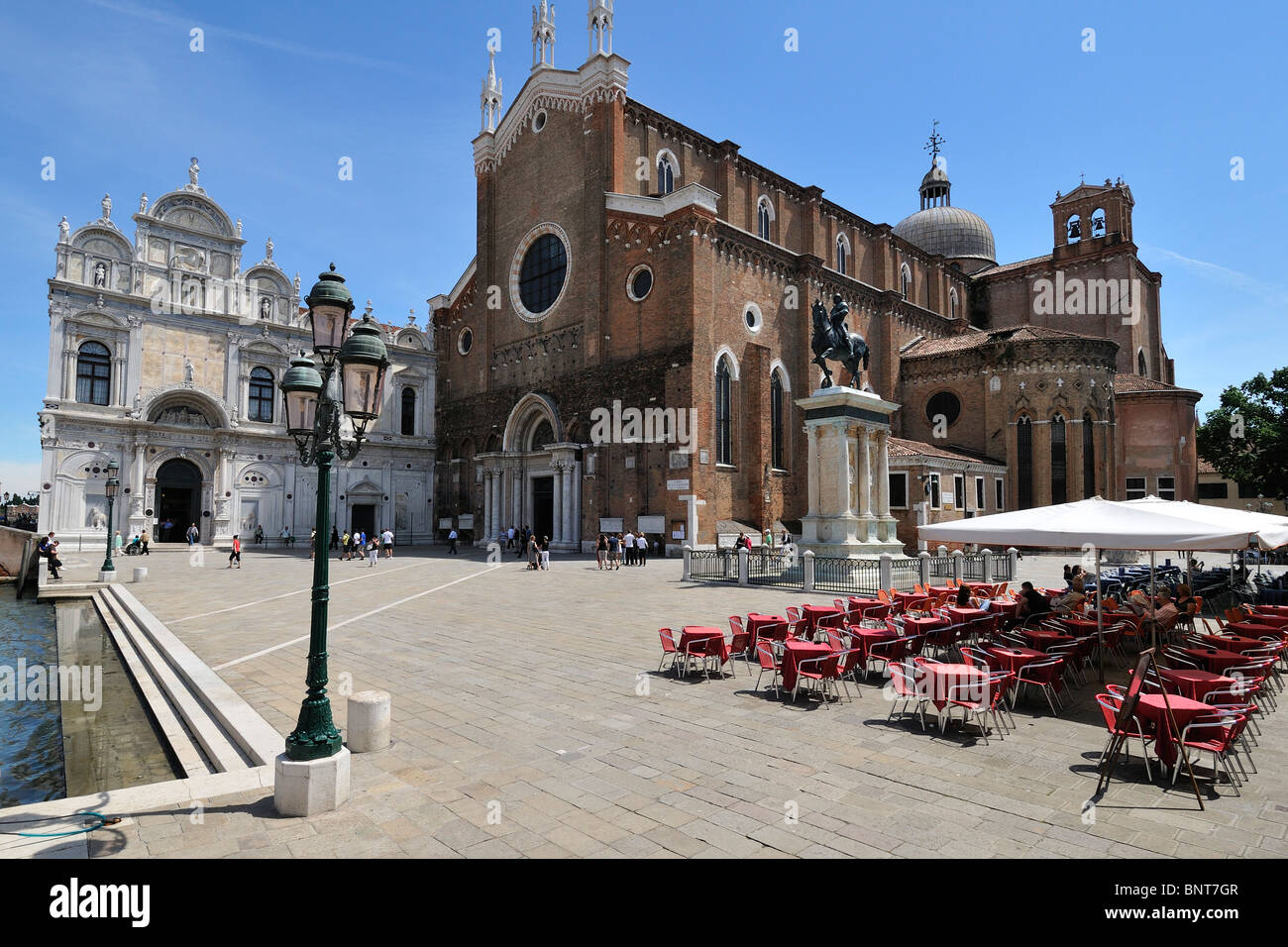 Venice. Italy. Campo Santi Giovanni e Paolo, Scuola Grande di San Marco (Left) the church of Santi Giovanni e Paolo (Right) Stock Photo