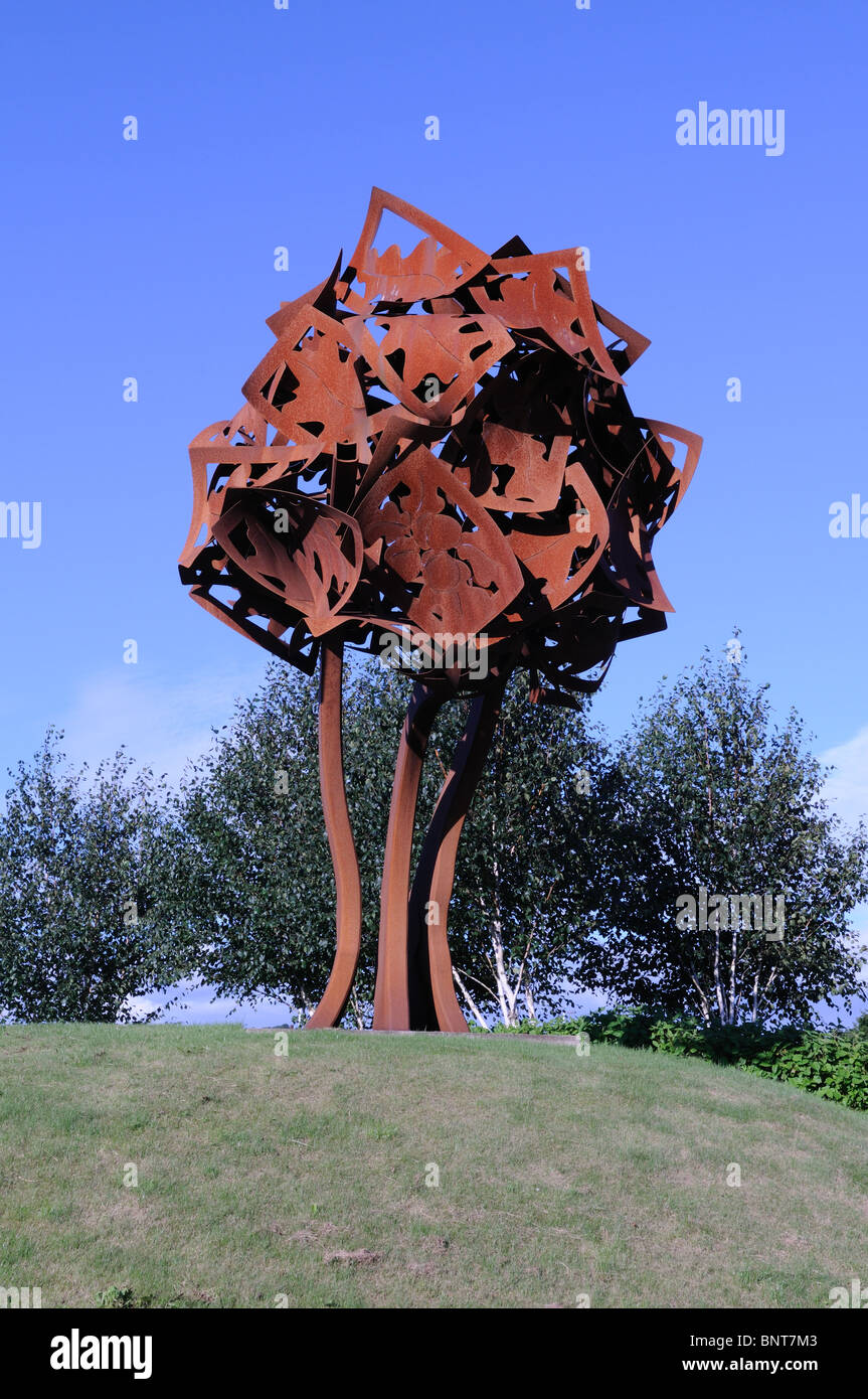 Rusty metal Oak tree gateway sculpture on the Llangunnor roundabout Carmarthen Caramrthenshire Wales Cymru UK GB Stock Photo