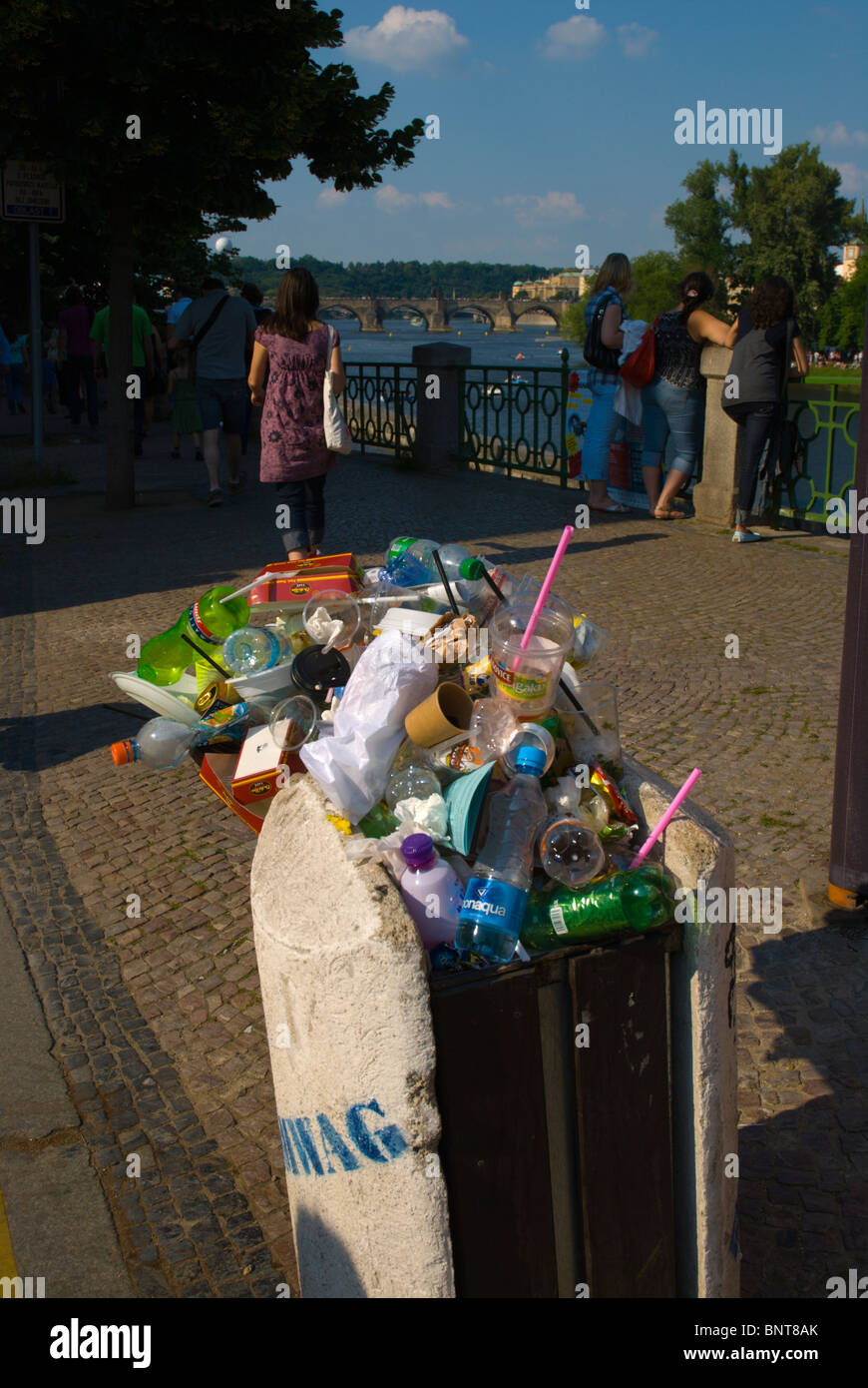 Overflowing rubbish bin central Prague Czech Republic Europe Stock Photo