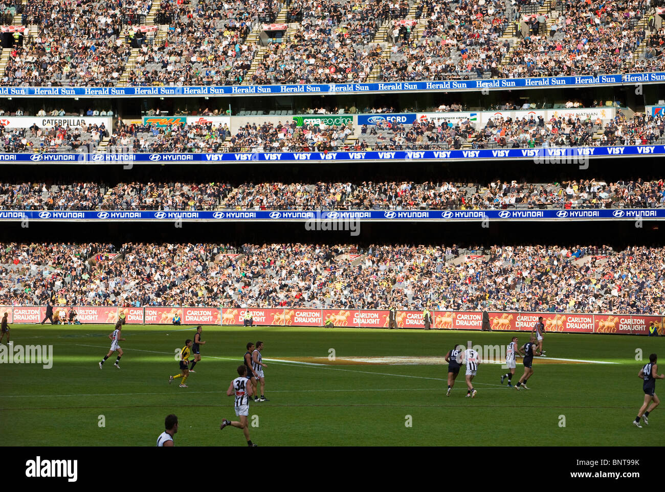 Crowds fill the Melbourne Cricket Ground during a game of Australian Rules Football in Melbourne, Victoria, AUSTRALIA. Stock Photo