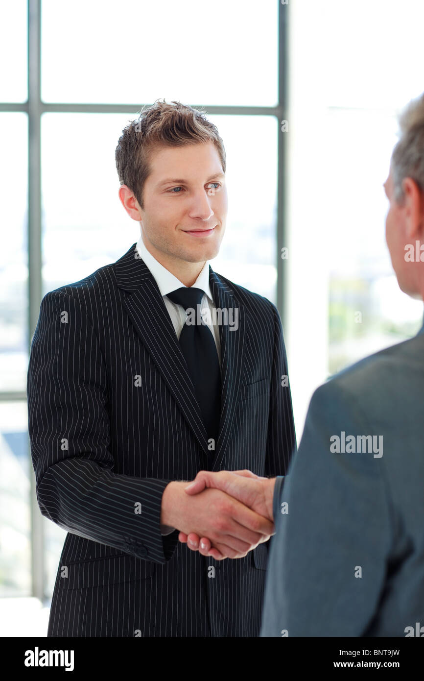 Two Business Man shaking hands Stock Photo