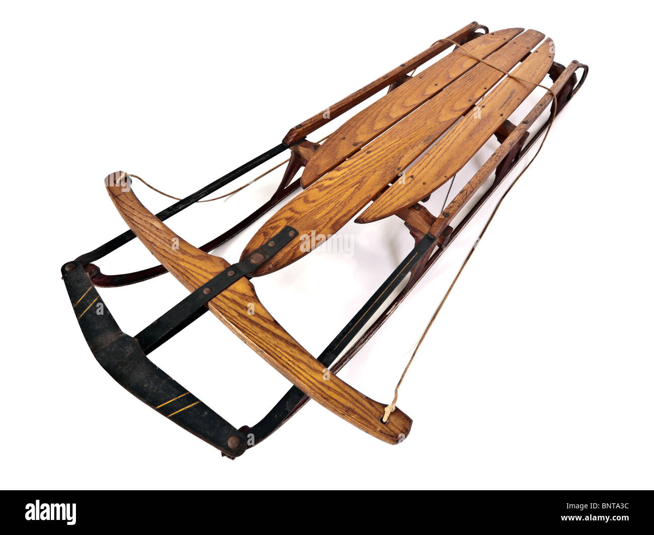 Old, worn snow sled from the 1940's. Stock Photo