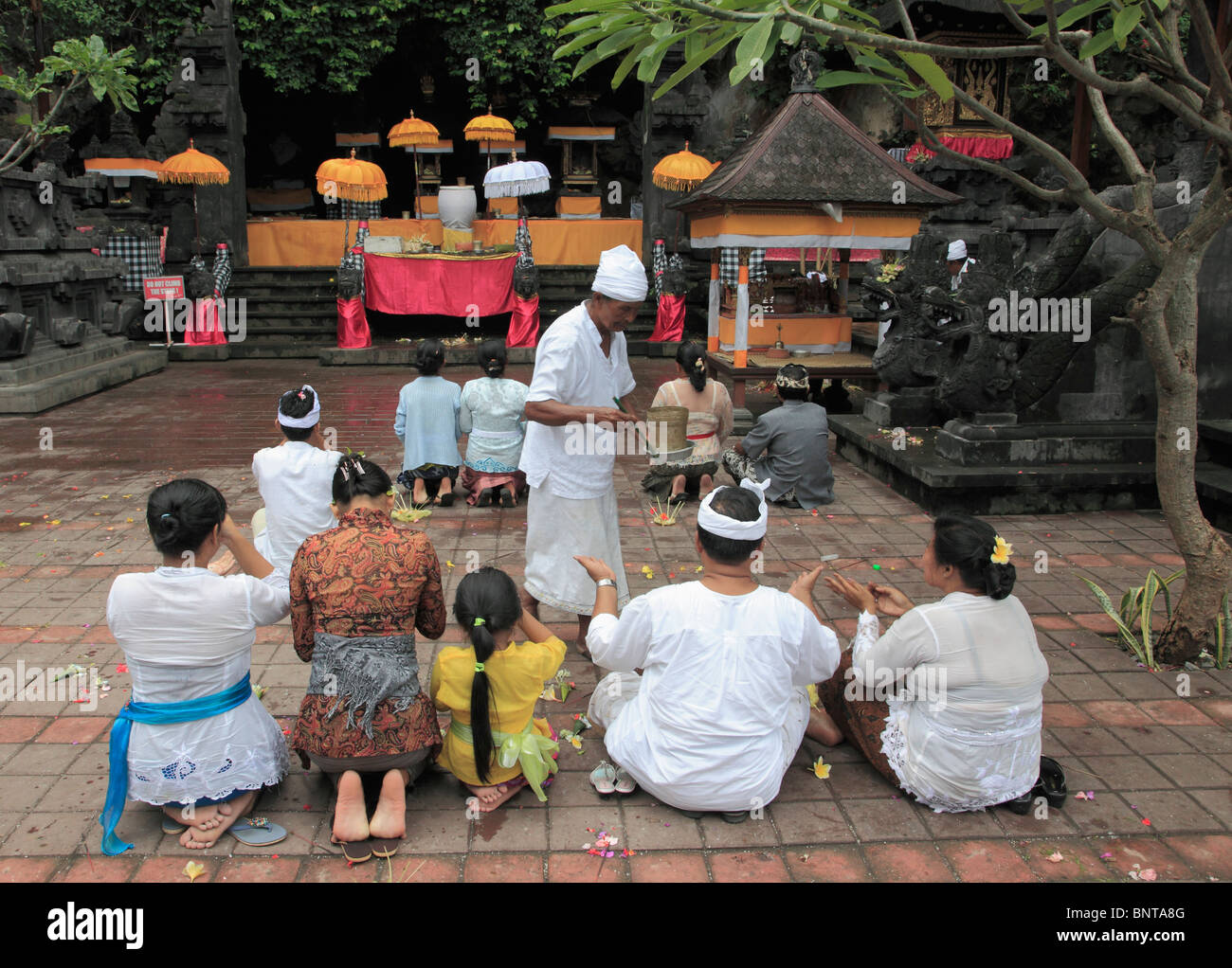 Indonesia, Bali, Goa Lawah Temple, religious ceremony, people, Stock Photo