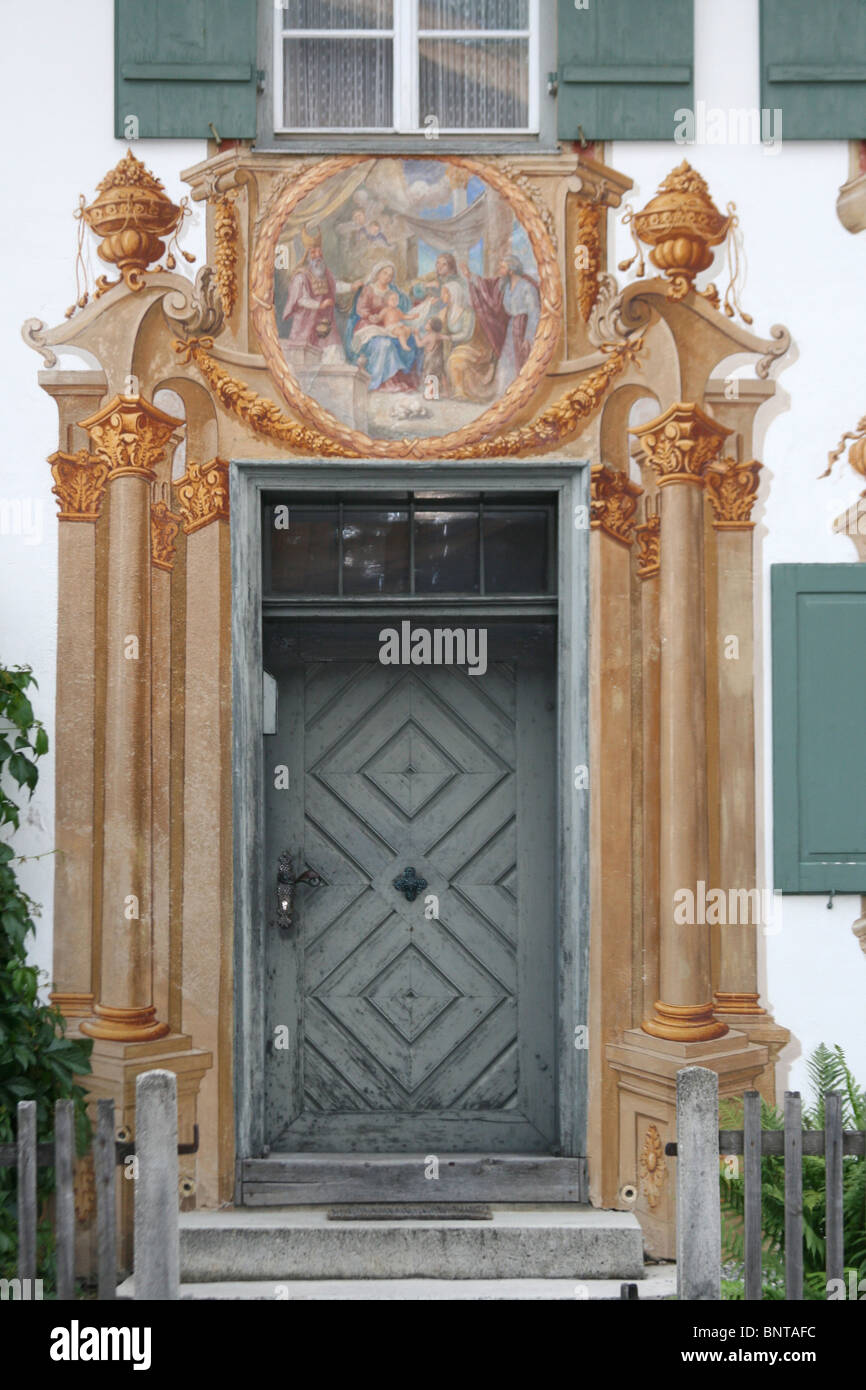 Building's front door, Oberammergau, Bavaria, Germany. Trompe L'oeil effect Stock Photo