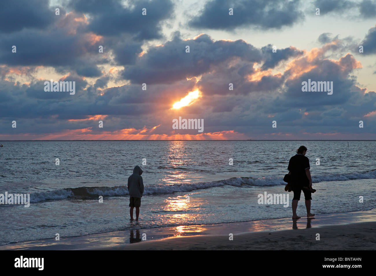 sunset at the beach of Borkum Town, Borkum Island, East Friesland, North Sea Coast, Lower Saxony, Germany Stock Photo