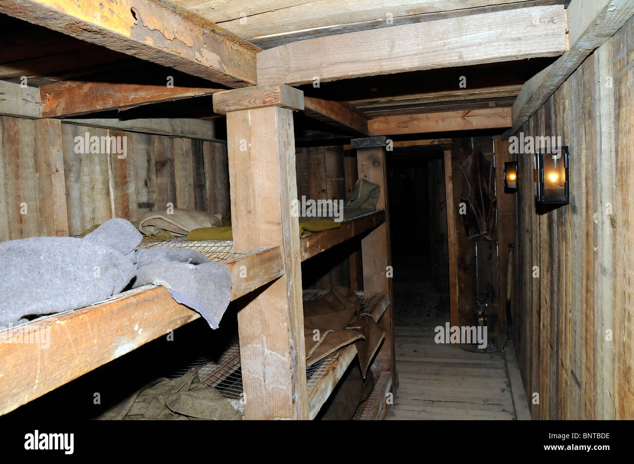 Bunk room in the trench and dugout reconstruction of the Memorial Museum Passchendale 1917, Zonnebeke Chateau, Belgium Stock Photo
