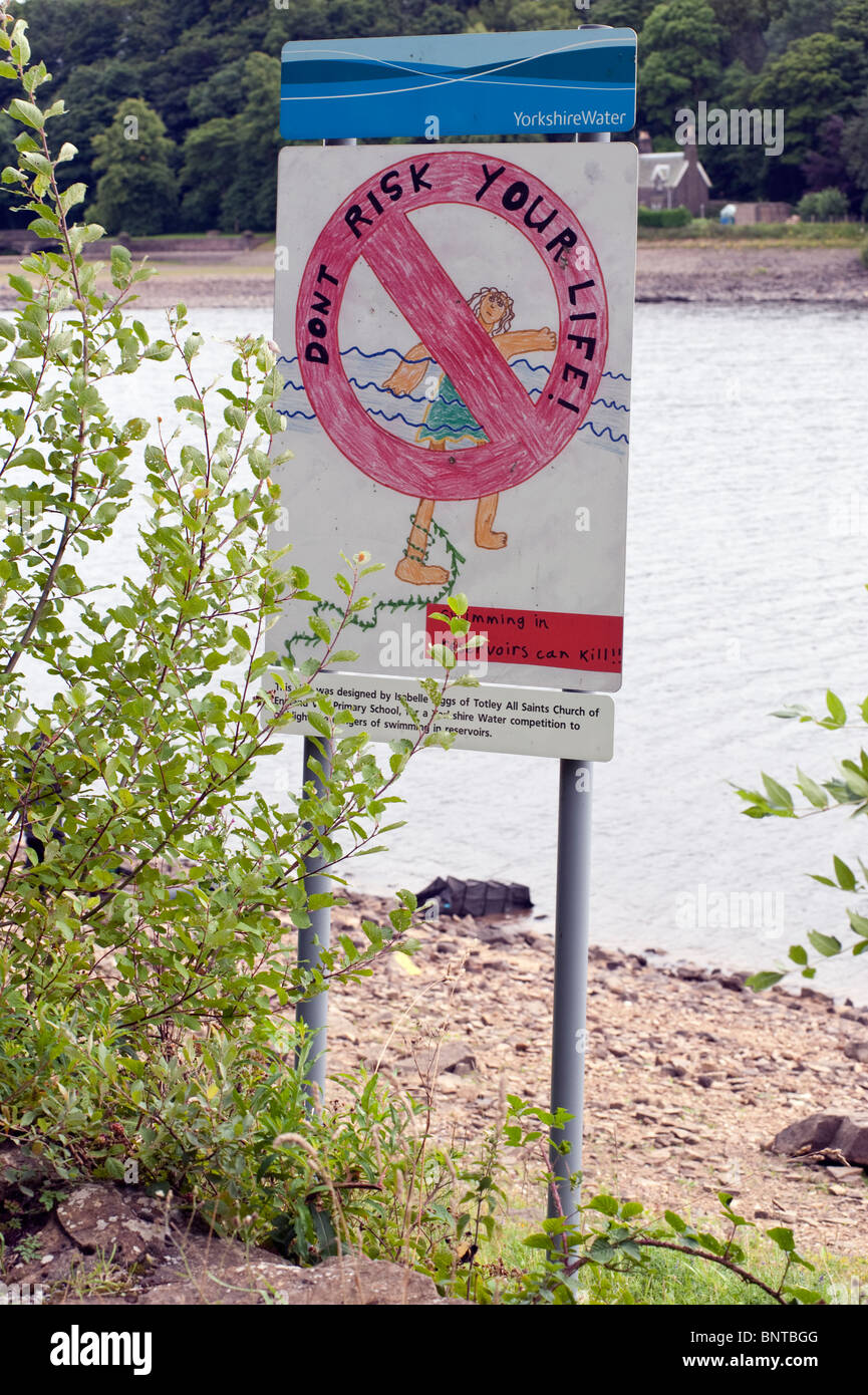 School pupil designed no swimming warning sign on a deep dangerous reservoir Stock Photo