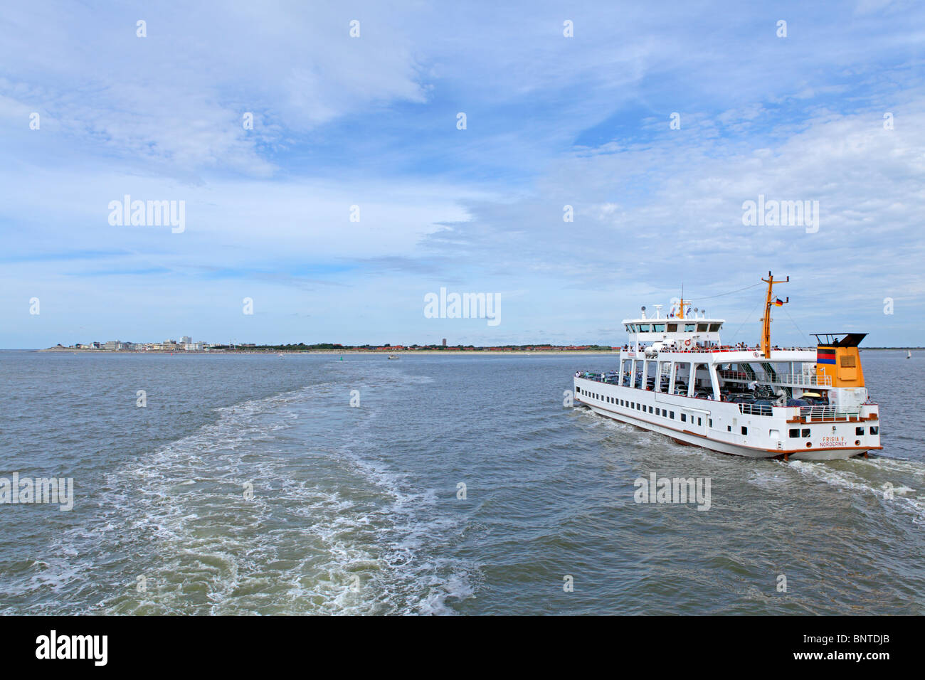 the ferry approaching Norderney island, East Friesland, Lower Saxony, Germany Stock Photo