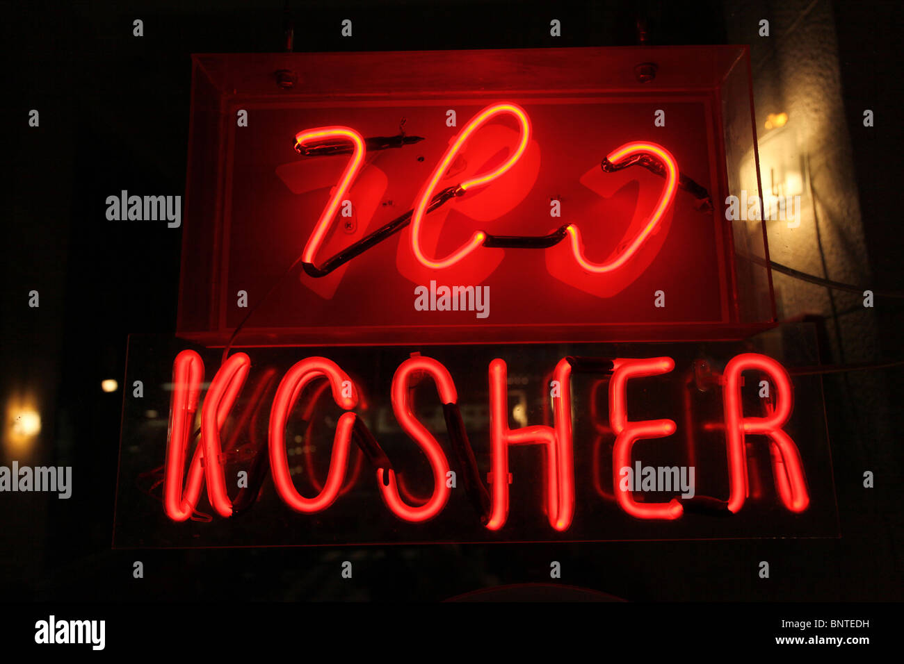 The Hebrew word Kosher in Hebrew and English at the entrance to a restaurant, indicates that the foods offered conform to the Jewish dietary regulations of kashrut (dietary law), Israel Stock Photo