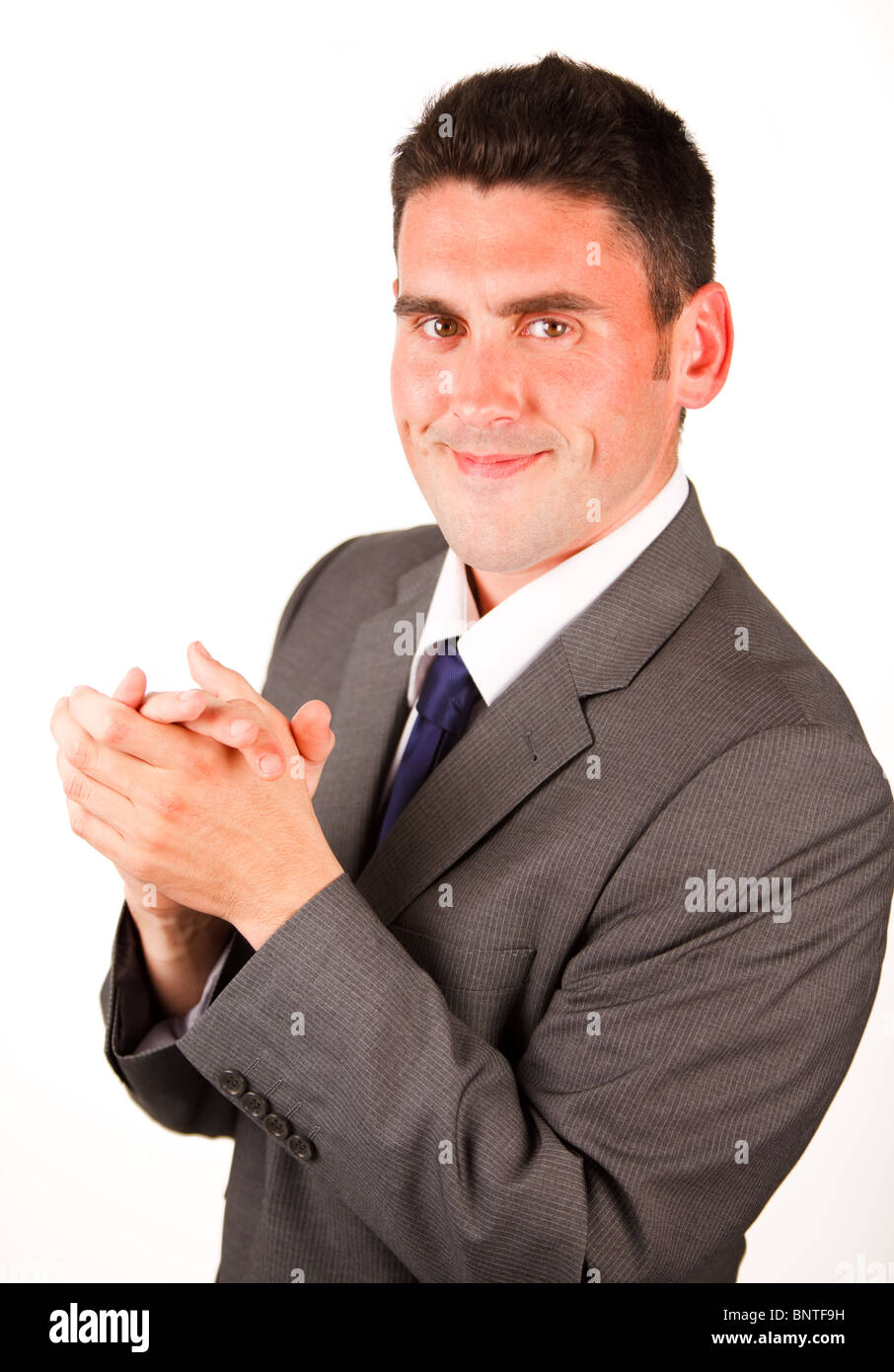 High view of businessman clapping against white background Stock Photo