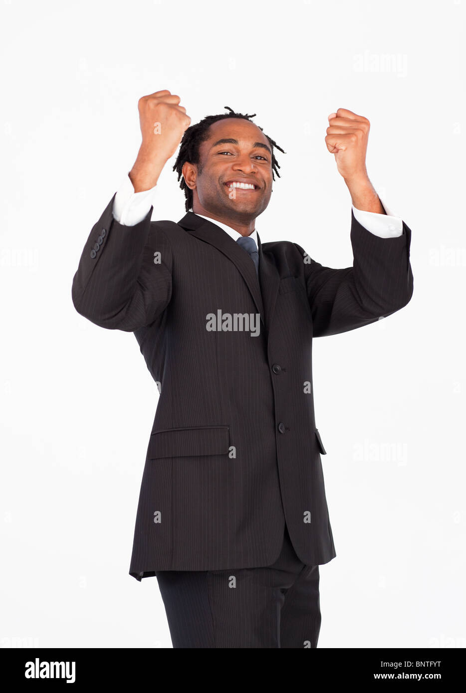 Successful businessman with raised arms Stock Photo - Alamy