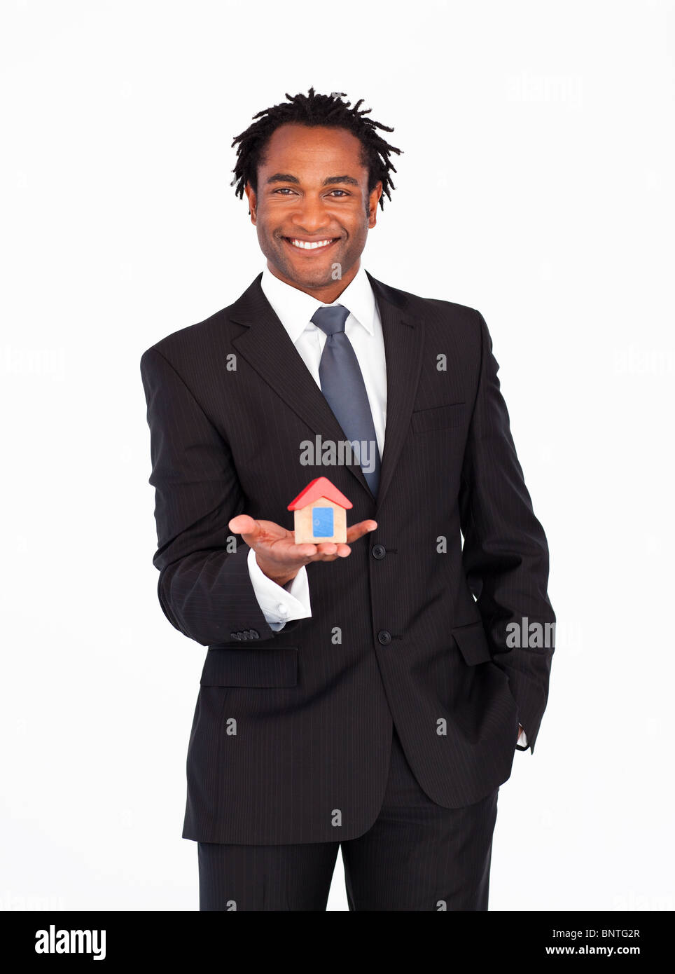 Businessman with house for real estate concept Stock Photo - Alamy
