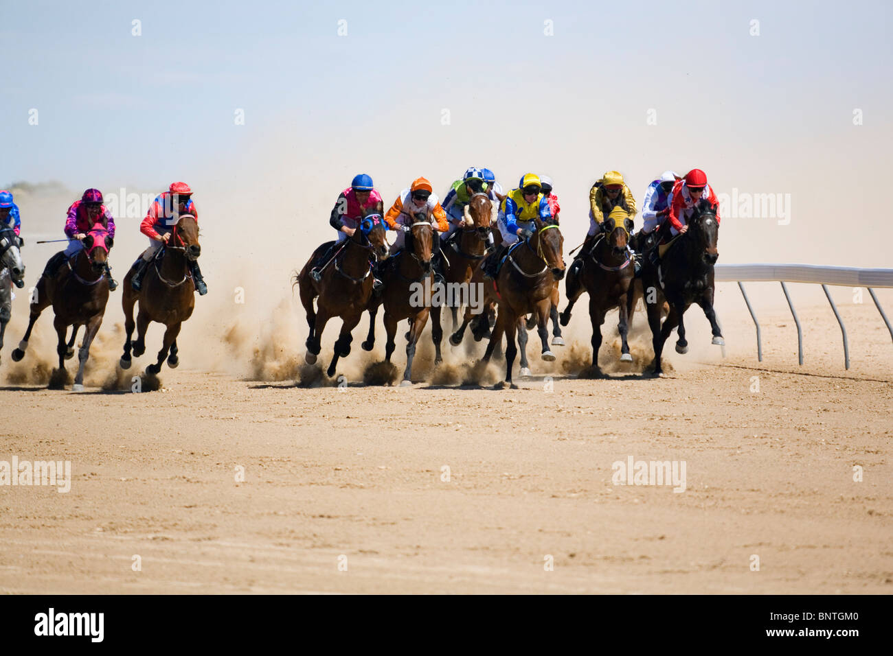Horse racing in the outback at the Birdsville Cup races.  Birdsville, Queensland, AUSTRALIA. Stock Photo