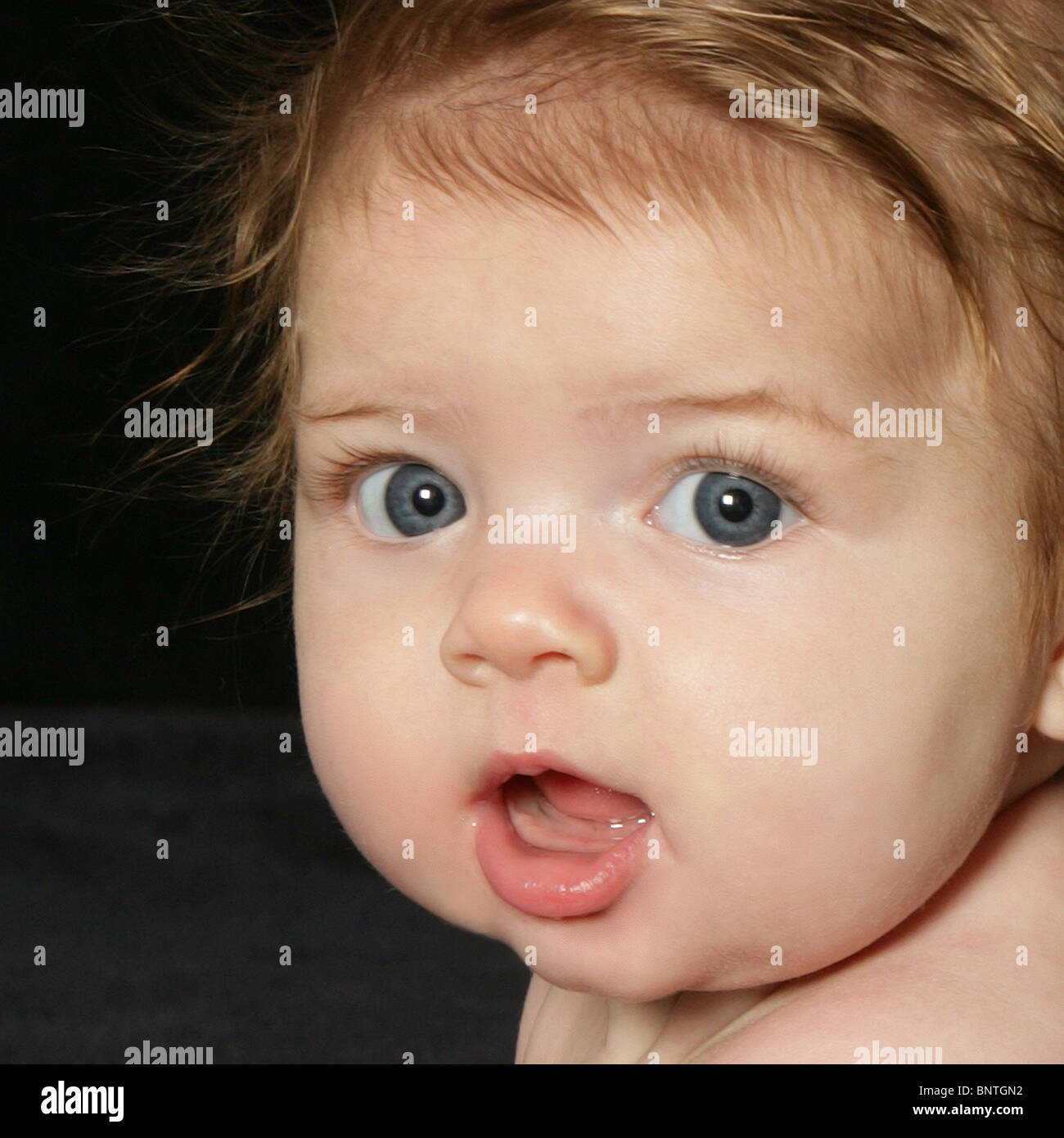 Baby Red Hair Blue Eyes Close Up Curious Stock Photo Alamy