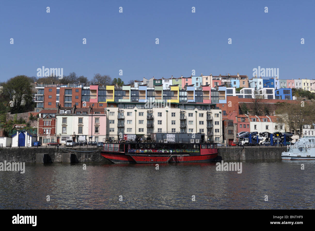 Bristol harbour and colourful houses hillside, Bristol England UK. River Avon quayside and waterfront residential buildings Stock Photo