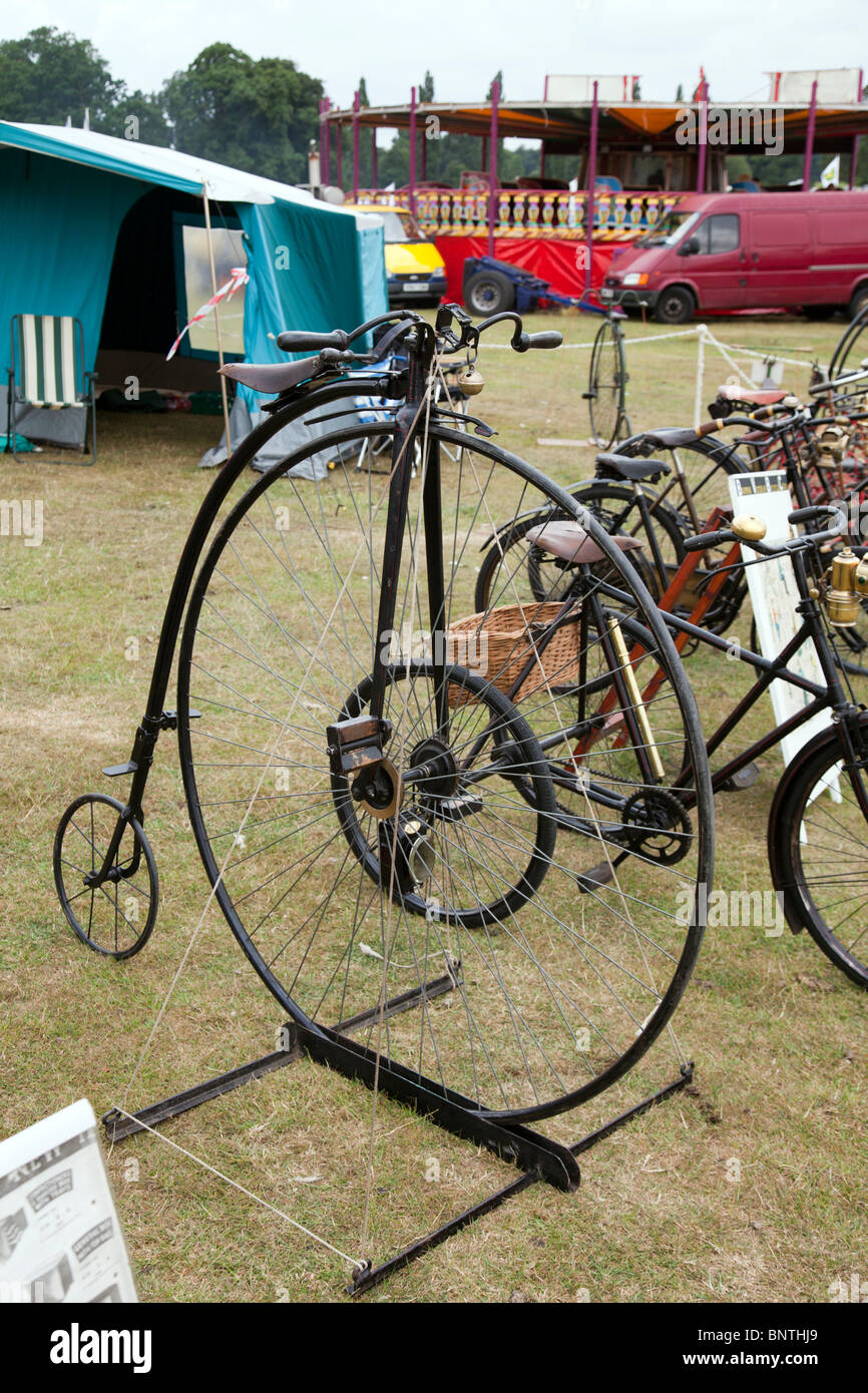 Old antique penny farthing bike at Revesby Lincolnshire England large front wheel small rear Stock Photo Alamy