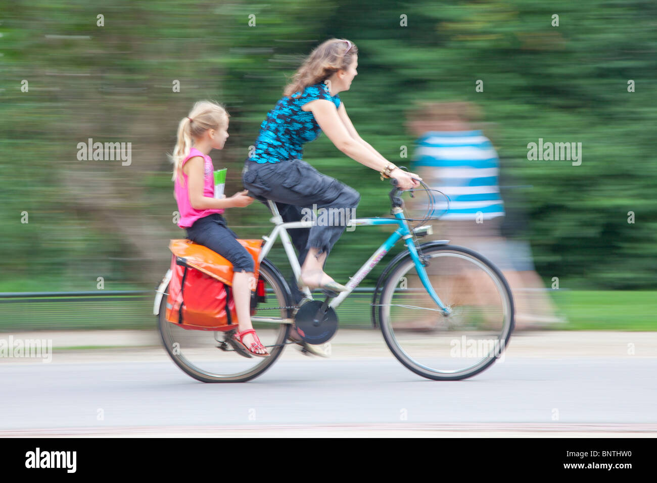 Girl on back of bike best sale