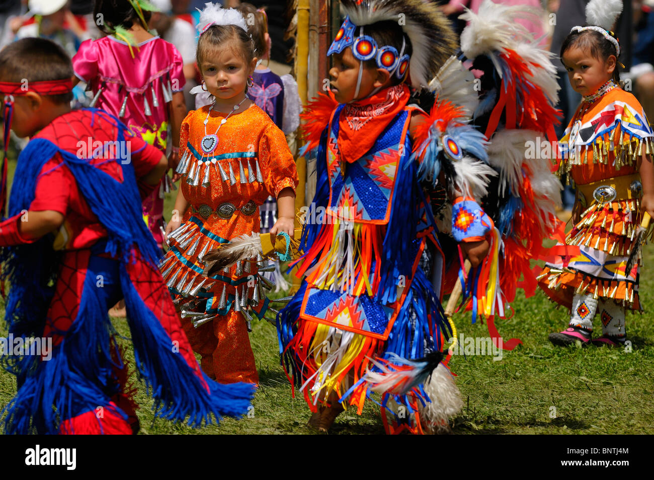 Young children Native Indian dancers in tiny tots competition at Six Nations Reserve Pow Wow Grand River Ontario Stock Photo