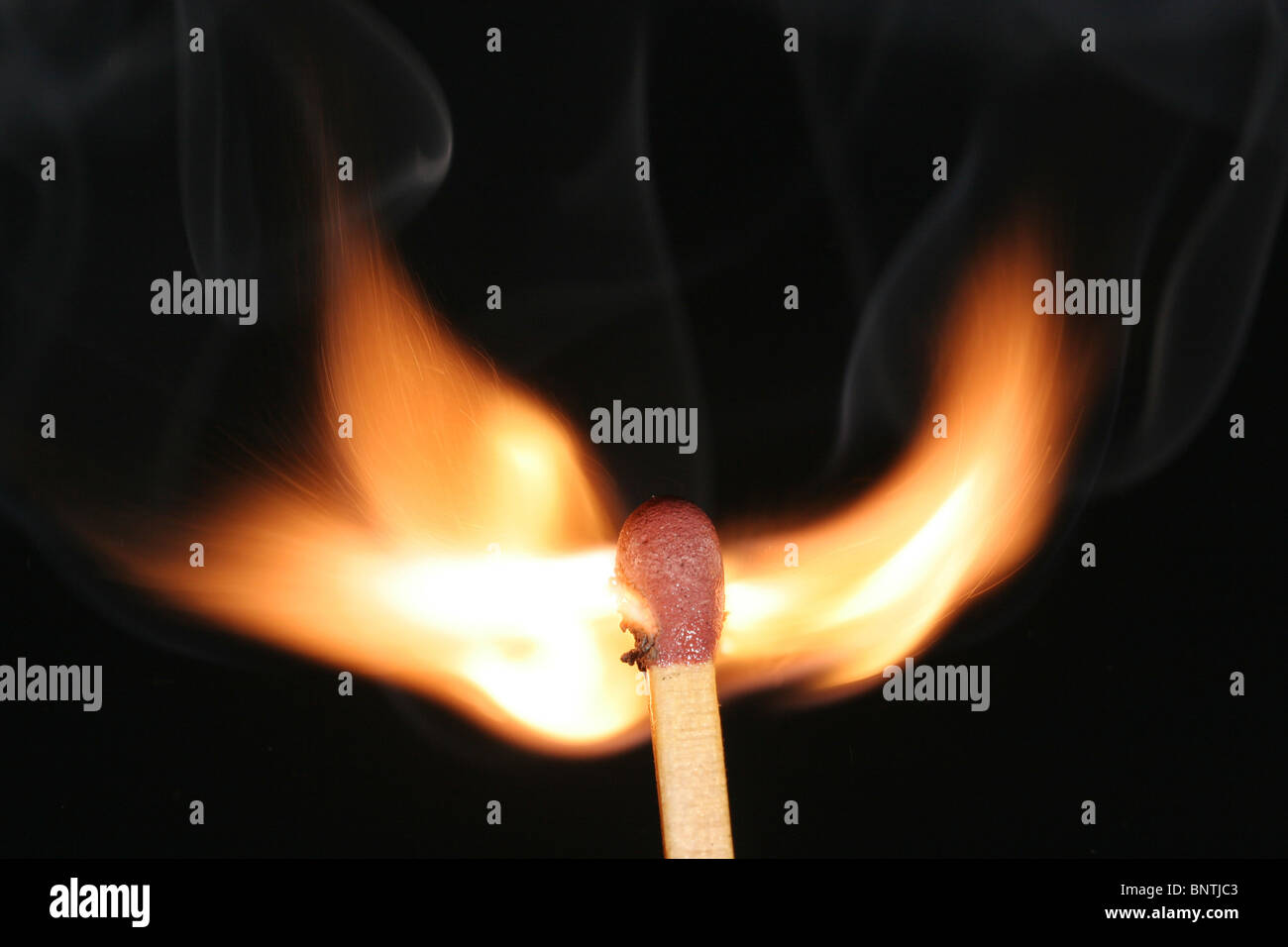A lighting match Stock Photo Alamy