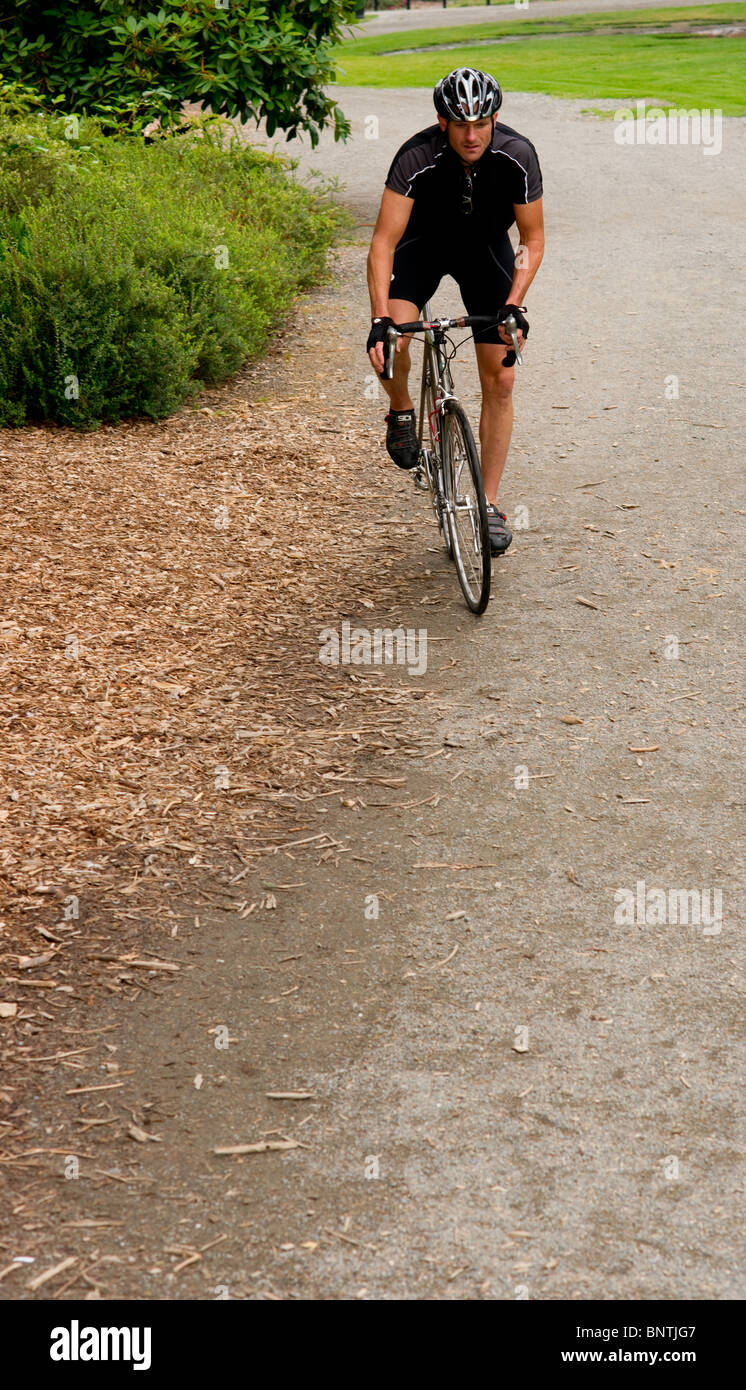 Male cyclist riding black hi-res stock photography and images - Alamy