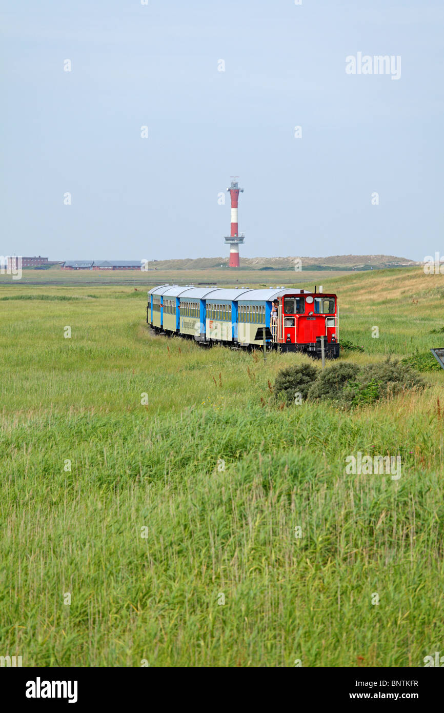 new lighthouse and island train, Wangerooge island, East Friesland, Lower Saxony, Germany Stock Photo