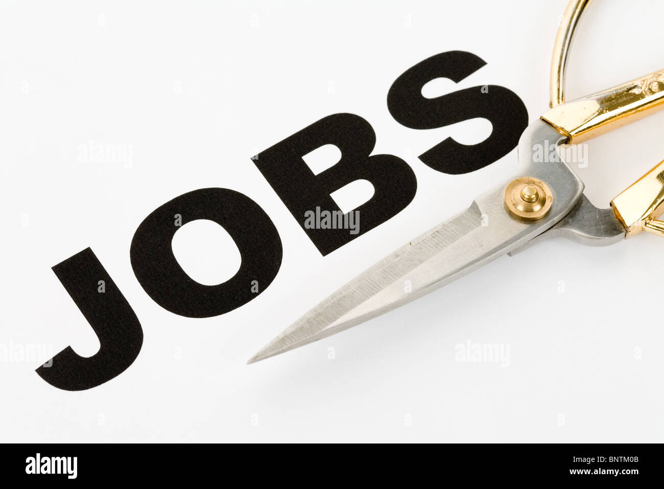 Word of job and scissors, concept of Jobs Cut Stock Photo
