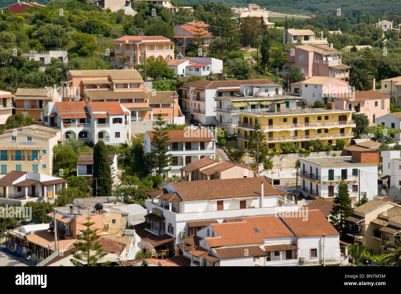 View over holiday apartments in the village of Kassiopi on the Greek