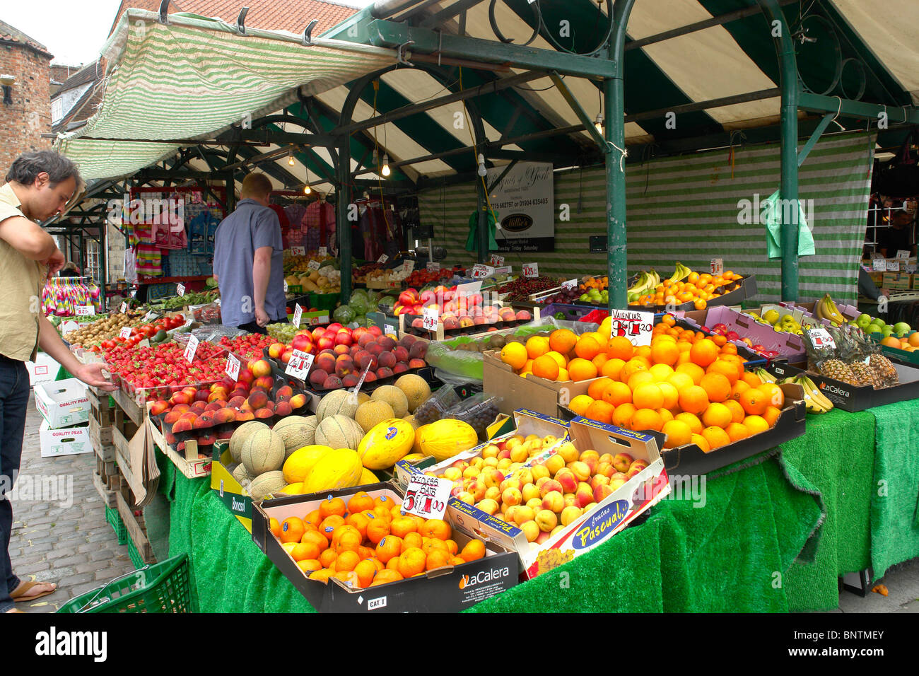 Fruit and vegetable stall in York market, Yorkshire Stock Photo