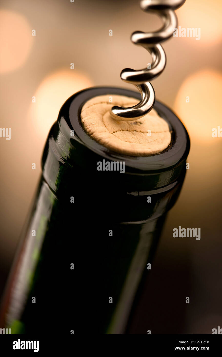 Opening a bottle of wine in celebration Stock Photo Alamy