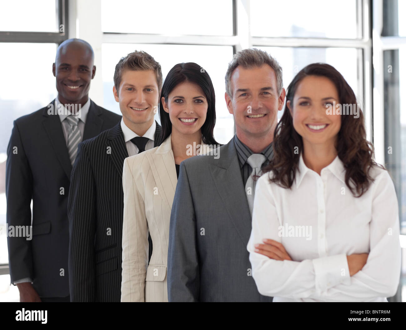 Business woman leading a business team Stock Photo - Alamy