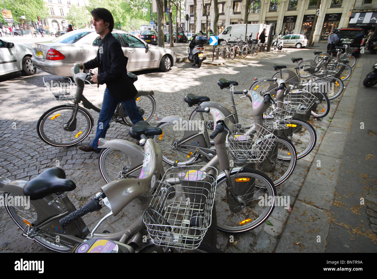 Velib bicycles for hire near l'Opera Paris France Stock Photo