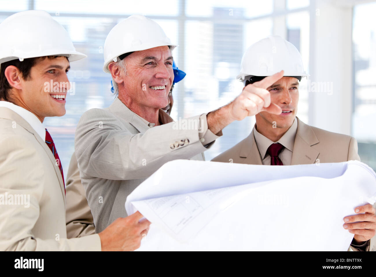 Architect explaining the project to the team Stock Photo - Alamy