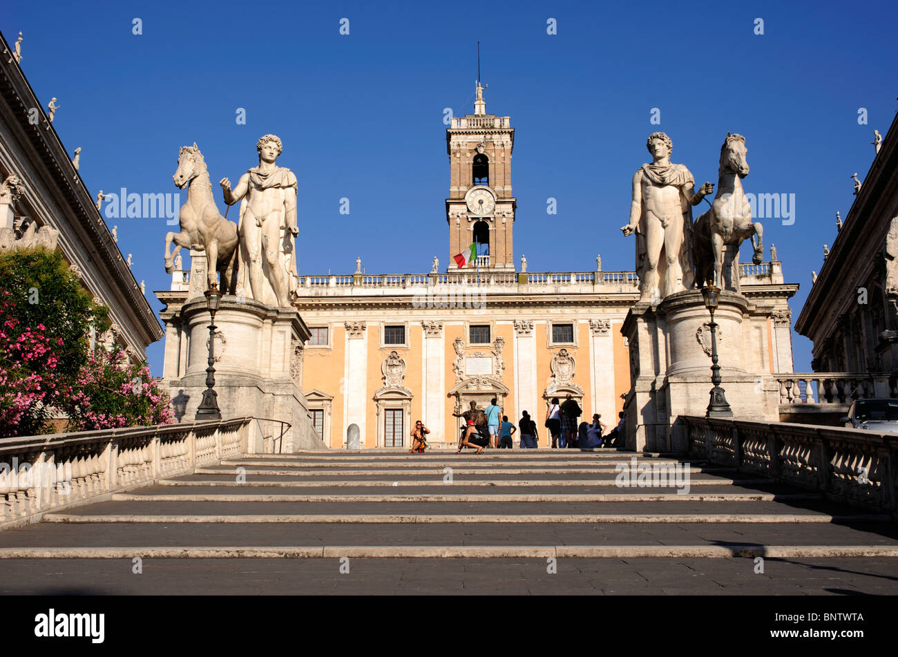 Italy, Rome, Capitoline Hill, Piazza del Campidoglio, statues of Castor and Pollux and Palazzo Senatorio Stock Photo