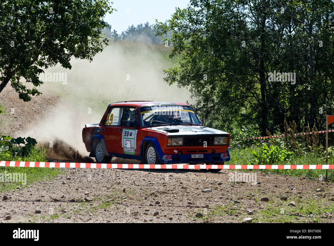 Rally Rezekne 2010. Red russian car - VAZ 2107 drifting. Stock Photo