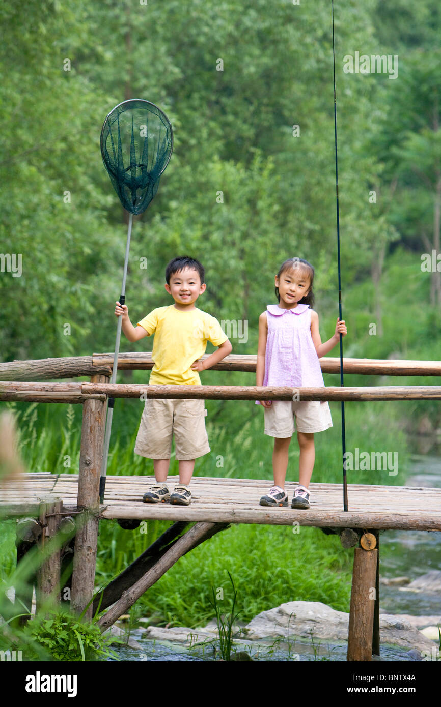 Two boys fishing asia hi-res stock photography and images - Alamy