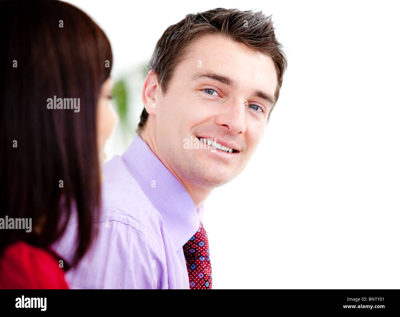 Smiling businessman looking at the camera Stock Photo - Alamy