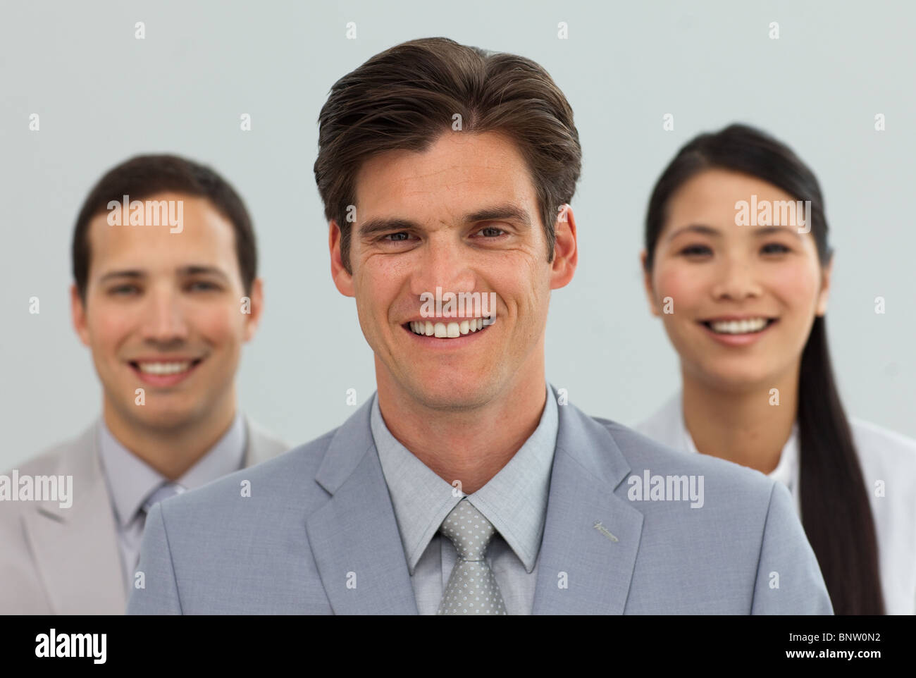 A diverse business people standing together Stock Photo - Alamy