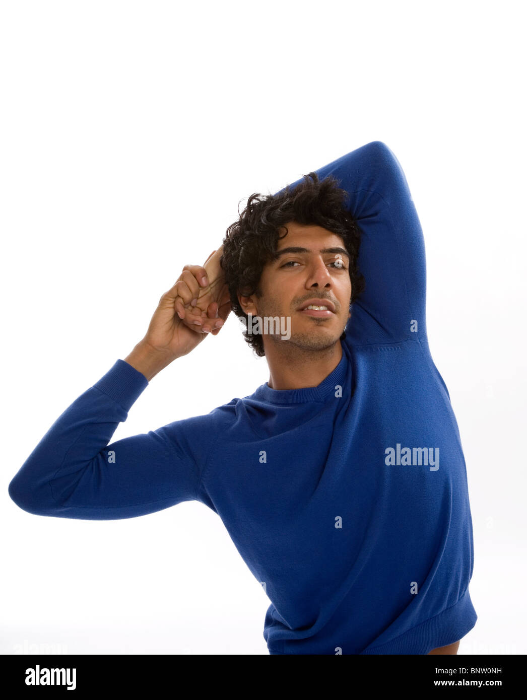 Man stretching upper body Stock Photo
