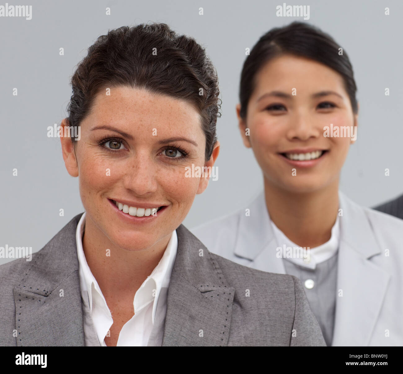 Attractive Business people standing in a line Stock Photo - Alamy