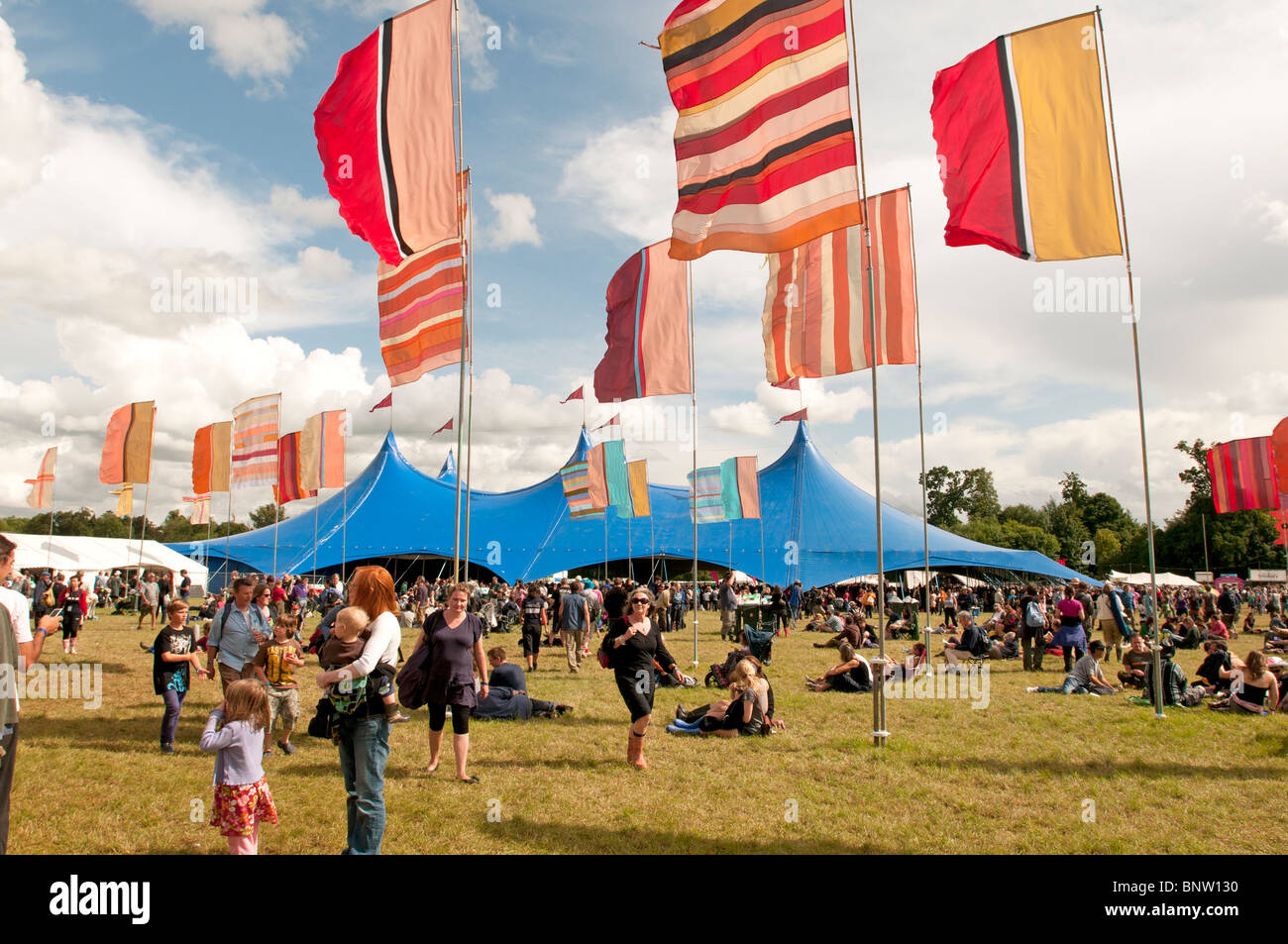 Tents and flags at the Womad music festival Charlton Park Wiltshire