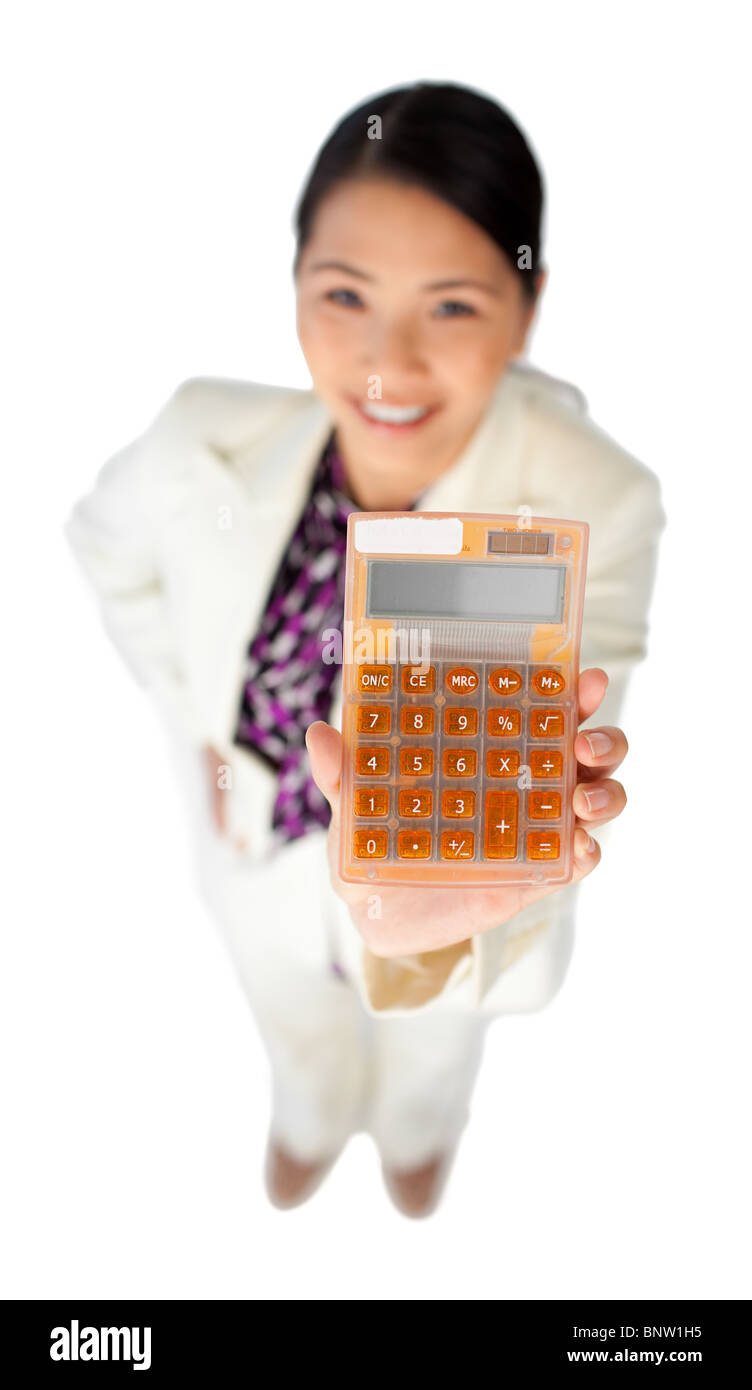 Attractive businesswoman using a calculator Stock Photo Alamy
