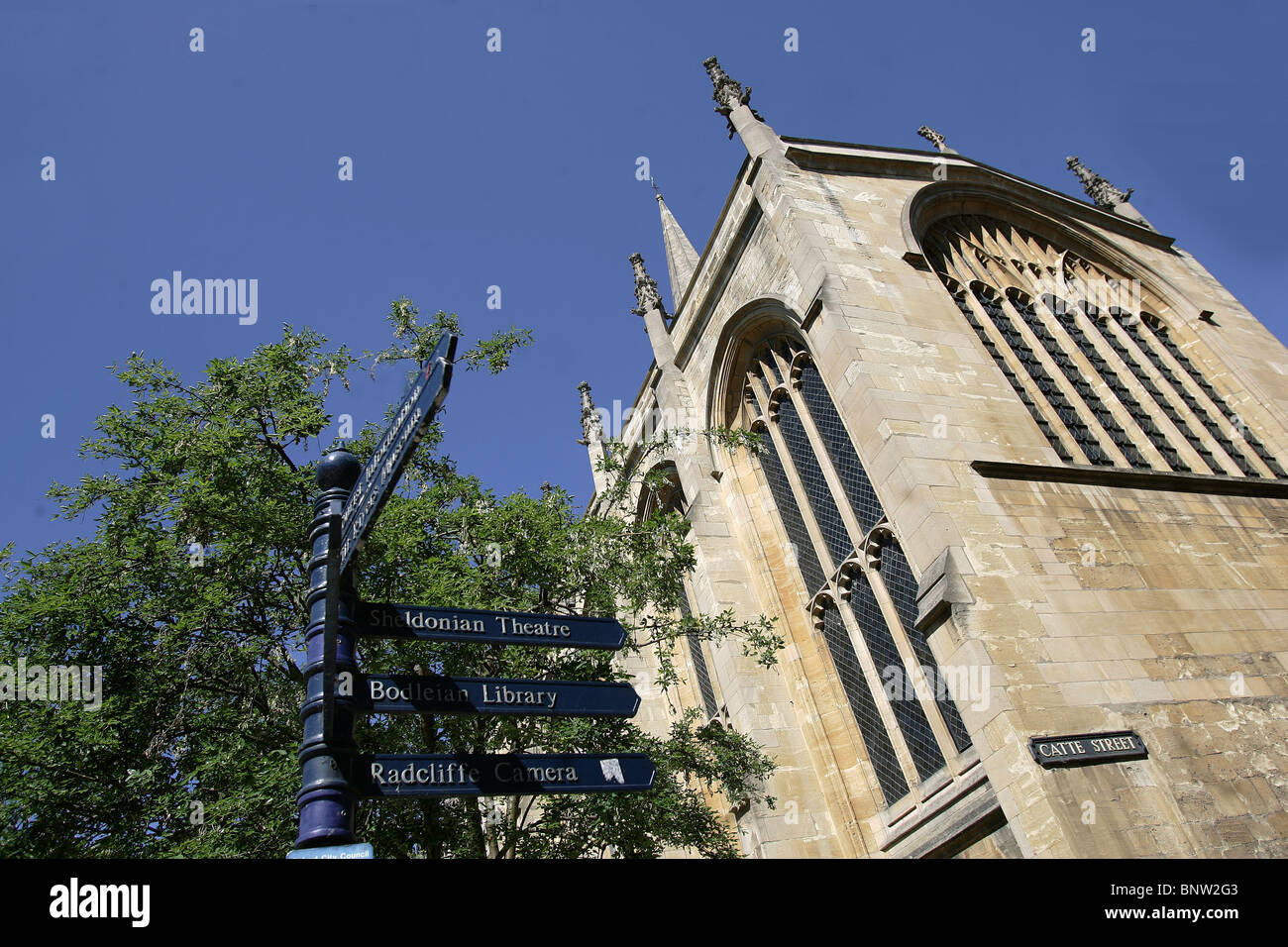 Oxford City scene, finger signpost showing directions to the Sheldonian Theatre, Bodleian Library and the Radcliffe Camera. Stock Photo